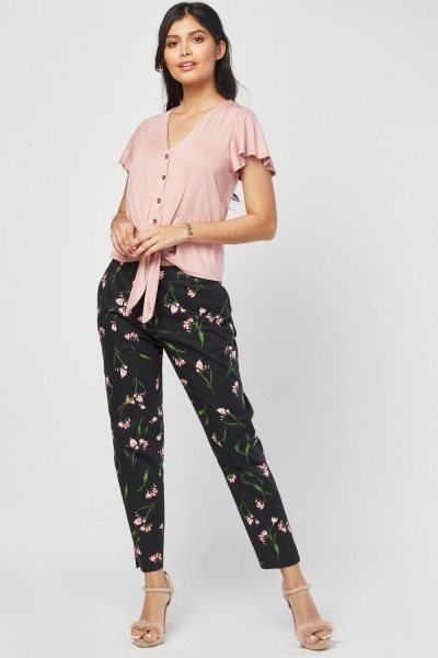 Kalhoty Flowers černé se vzorem vel. 34