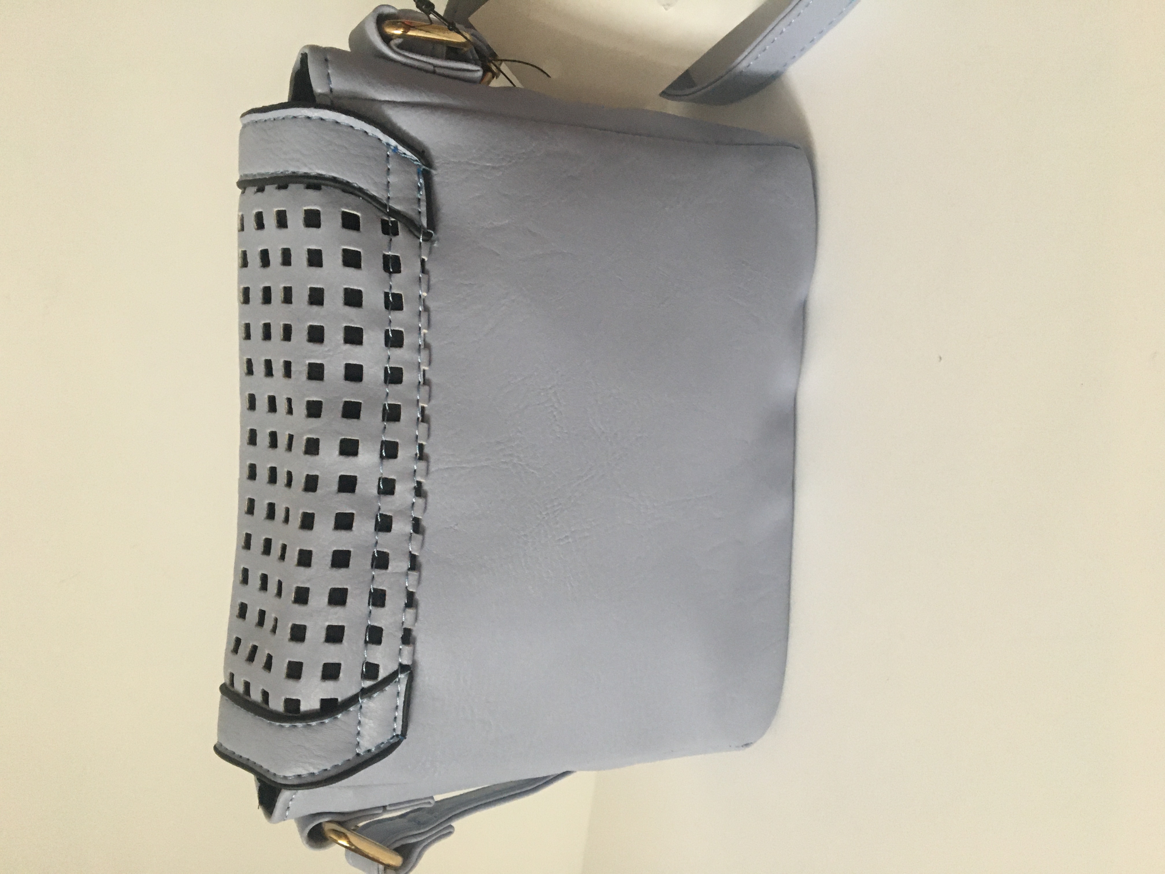 Kabelka malá fialová perforovaná